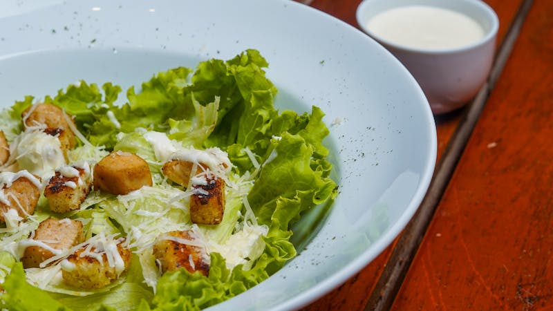 Caesar salad with croutons and dressing